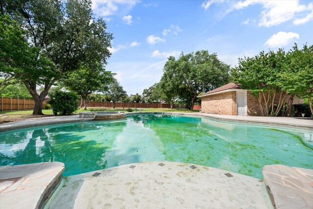 902 Mission Dr, Southlake, TX 76092 - view of pool with a fenced backyard and a pool with connected hot tub