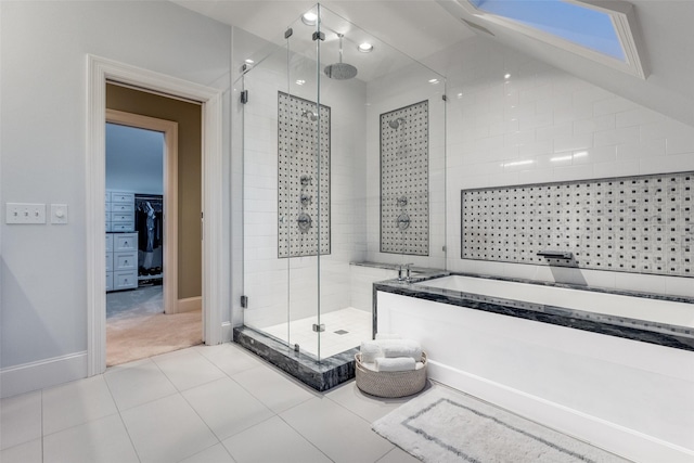 3217 Rankin St, University Park, TX 75205 - bathroom with a stall shower, a garden tub, tile patterned flooring, a spacious closet, and baseboards