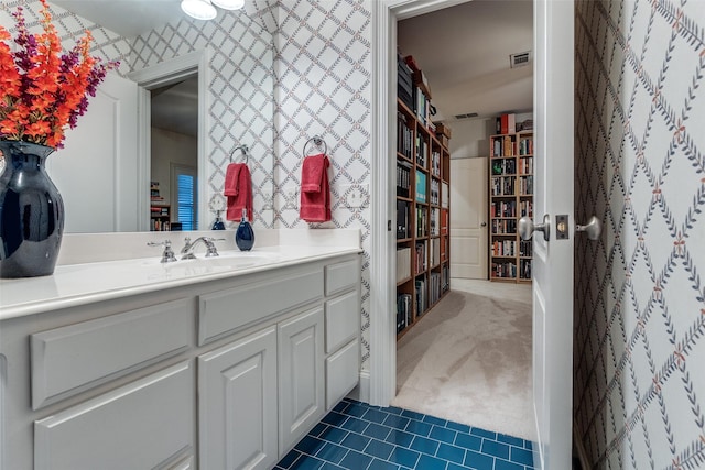 3217 Rankin St, University Park, TX 75205 - bathroom featuring tile patterned floors, vanity, and wallpapered walls