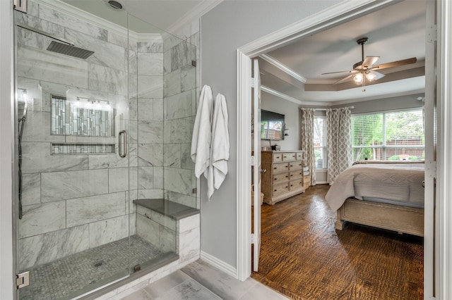 2362 Barret Dr, Frisco, TX 75033 - ensuite bathroom featuring crown molding, a ceiling fan, a stall shower, baseboards, and a raised ceiling