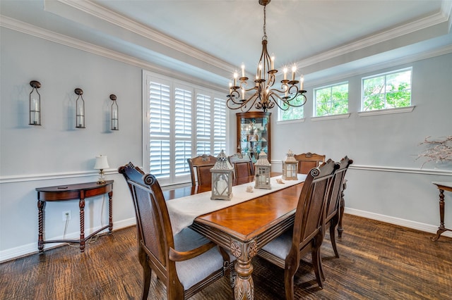 2362 Barret Dr, Frisco, TX 75033 - dining area featuring a chandelier, crown molding, wood finished floors, and baseboards