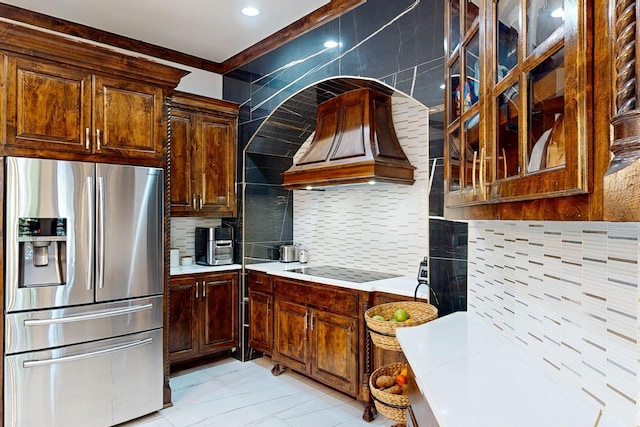 5720 County Road 1094, Celeste, TX 75423 - kitchen with stainless steel fridge, light countertops, backsplash, black electric stovetop, and premium range hood