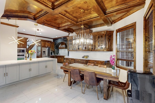 5720 County Road 1094, Celeste, TX 75423 - dining space with a chandelier, coffered ceiling, ornamental molding, and wooden ceiling with exposed beams
