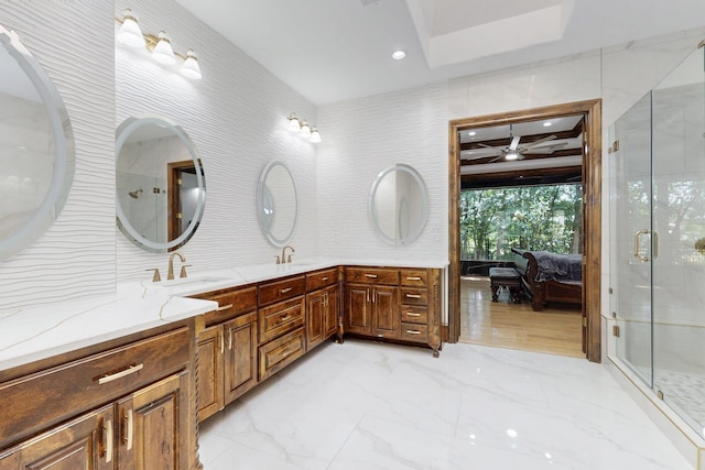 5720 County Road 1094, Celeste, TX 75423 - ensuite bathroom featuring marble finish floors, double vanity, and a stall shower