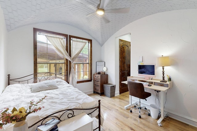 5720 County Road 1094, Celeste, TX 75423 - bedroom featuring light wood-style flooring, vaulted ceiling, an office area, baseboards, and ceiling fan
