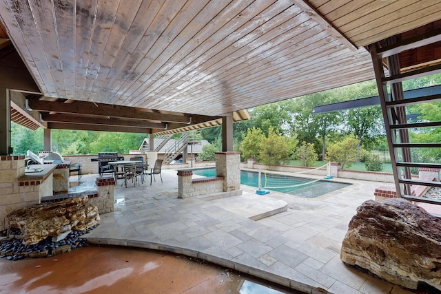 5720 County Road 1094, Celeste, TX 75423 - view of patio with an outdoor pool, a hot tub, outdoor dining space, exterior bar, and stairs
