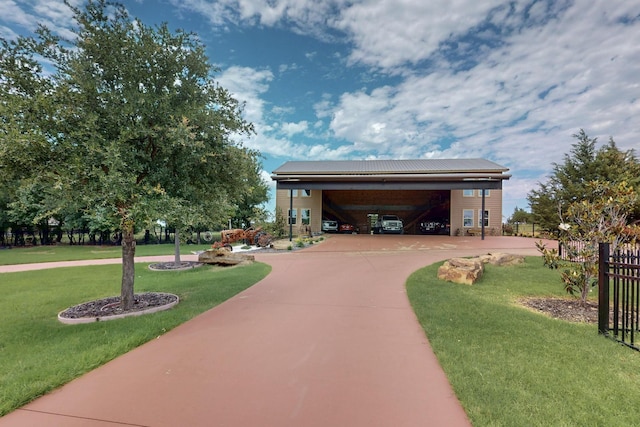 5720 County Road 1094, Celeste, TX 75423 - view of home's community with a yard and curved driveway