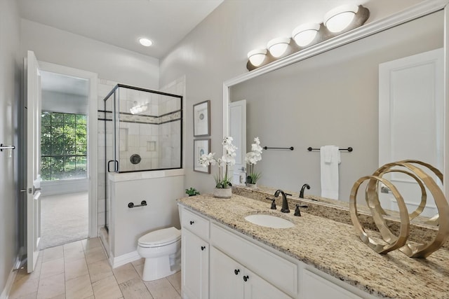 702 Malton Ln, Southlake, TX 76092 - bathroom featuring toilet, a stall shower, vanity, and baseboards