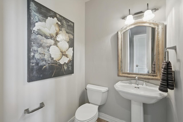 702 Malton Ln, Southlake, TX 76092 - bathroom with toilet and baseboards