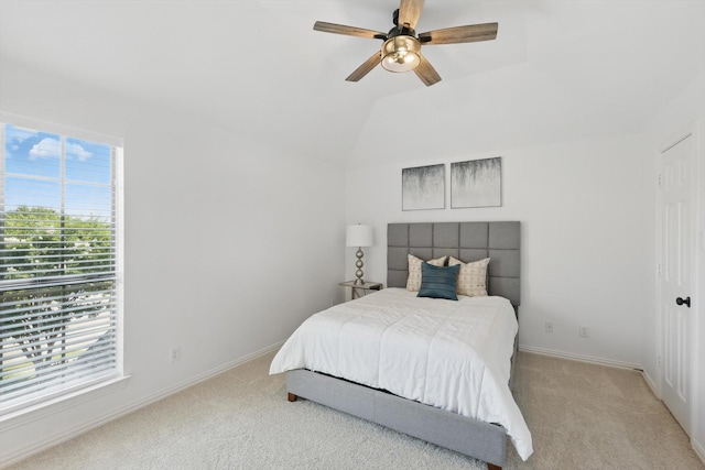 702 Malton Ln, Southlake, TX 76092 - bedroom with light colored carpet, baseboards, lofted ceiling, and ceiling fan