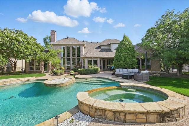 702 Malton Ln, Southlake, TX 76092 - view of swimming pool featuring a patio area, a pool with connected hot tub, and an outdoor hangout area