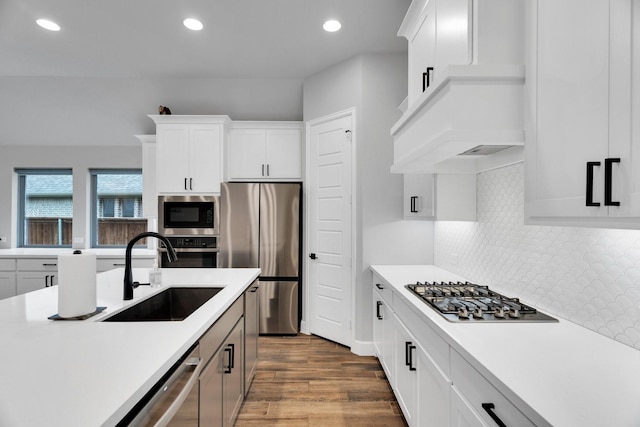 1210 Old Rocksprings Pass, Mansfield, TX 76063 - kitchen featuring appliances with stainless steel finishes, a sink, light countertops, recessed lighting, and dark wood finished floors