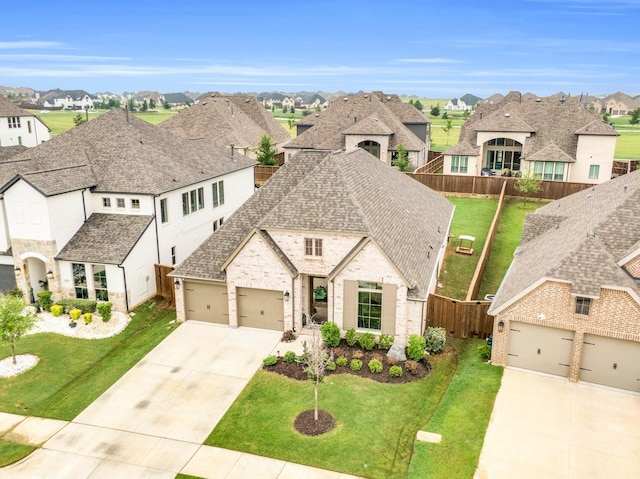 1210 Old Rocksprings Pass, Mansfield, TX 76063 - french country inspired facade featuring a residential view, concrete driveway, brick siding, and an attached garage