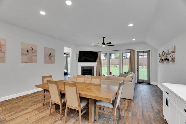 1210 Old Rocksprings Pass, Mansfield, TX 76063 - dining area featuring a ceiling fan, a fireplace, wood finished floors, recessed lighting, and baseboards