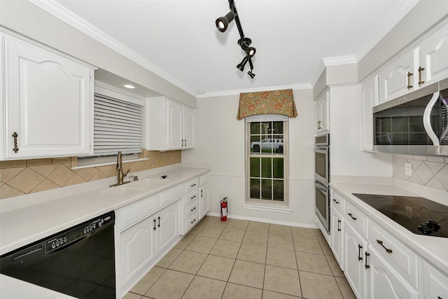 1631 Idlewood Dr, Sherman, TX 75092 - kitchen with black appliances, a sink, white cabinetry, decorative backsplash, and light tile patterned flooring