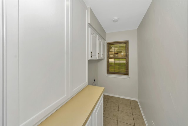 1631 Idlewood Dr, Sherman, TX 75092 - mudroom featuring light tile patterned floors and baseboards