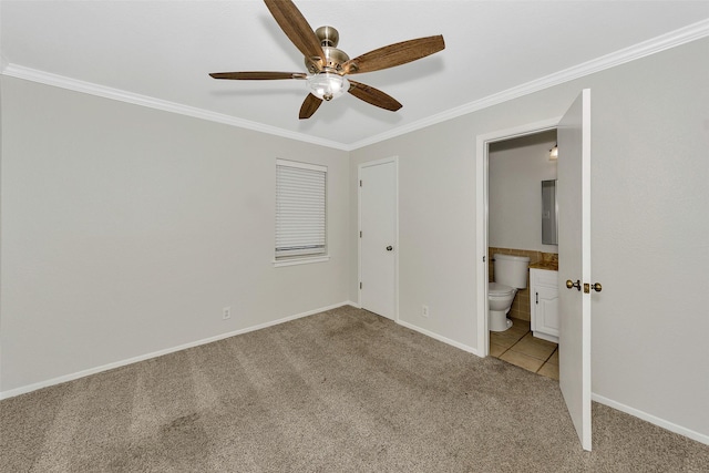 1631 Idlewood Dr, Sherman, TX 75092 - unfurnished bedroom with light colored carpet, ornamental molding, baseboards, ensuite bath, and a ceiling fan