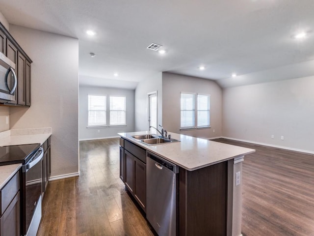 410 Wrangler Dr, Josephine, TX 75189 - kitchen featuring stainless steel appliances, a sink, open floor plan, dark wood-style floors, and baseboards