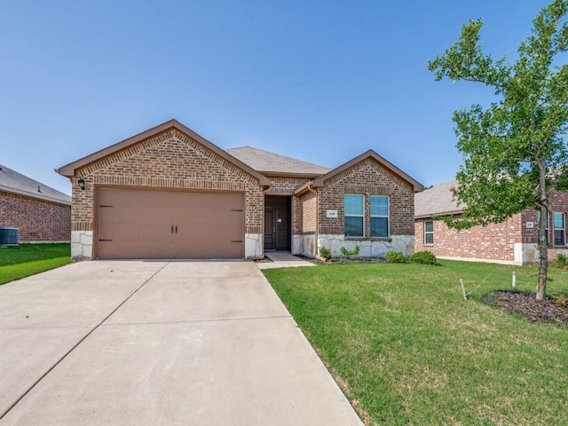 410 Wrangler Dr, Josephine, TX 75189 - ranch-style home with brick siding, an attached garage, a front lawn, concrete driveway, and central air condition unit