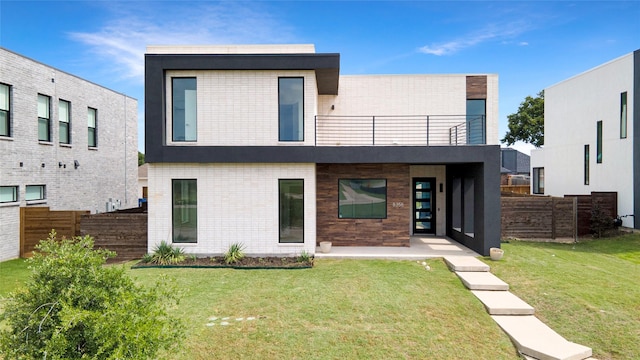 8356 Fairview Dr, Frisco, TX 75033 - rear view of house featuring a balcony and brick siding