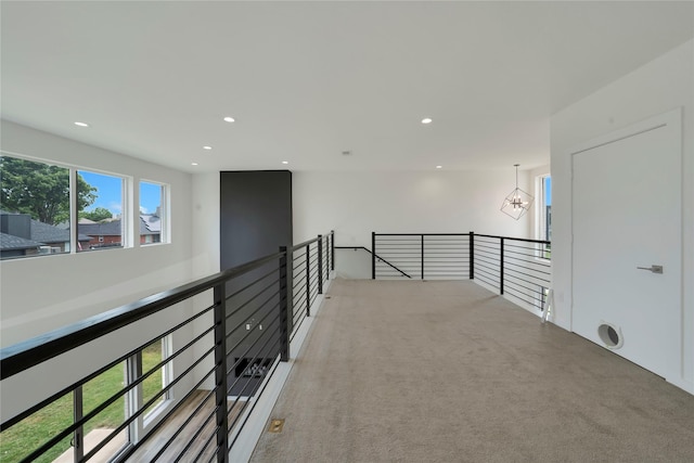 8356 Fairview Dr, Frisco, TX 75033 - corridor featuring light carpet, recessed lighting, a chandelier, and an upstairs landing