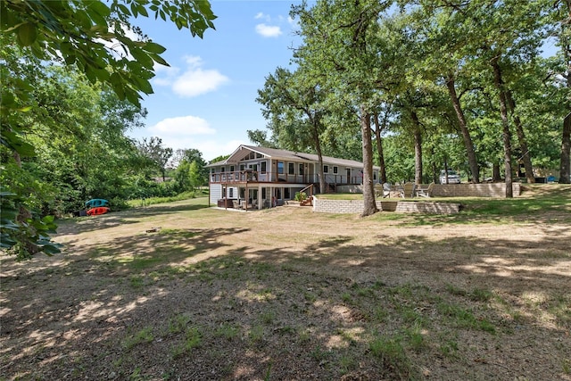 311 Oak Ln, Tool, TX 75143 - view of yard with a wooden deck and stairs