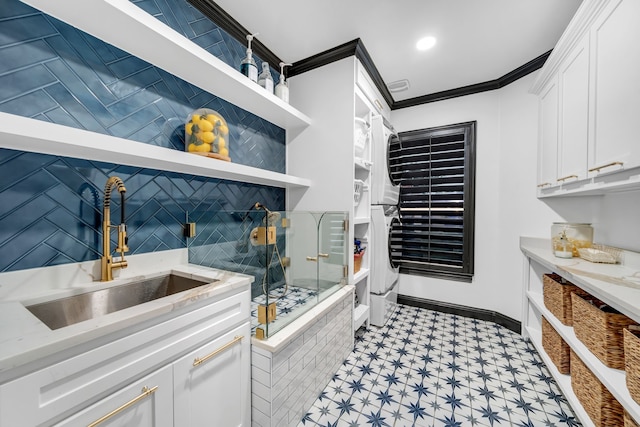 2600 Lakeview Ct, Prosper, TX 75078 - kitchen featuring a sink, open shelves, light flooring, white cabinets, and crown molding