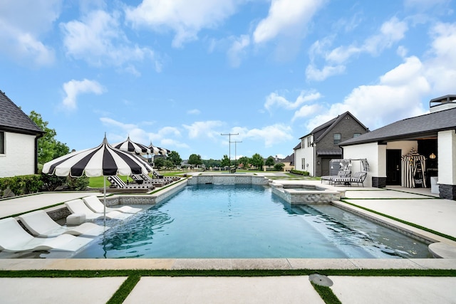 2600 Lakeview Ct, Prosper, TX 75078 - view of swimming pool with a pool with connected hot tub and a patio area