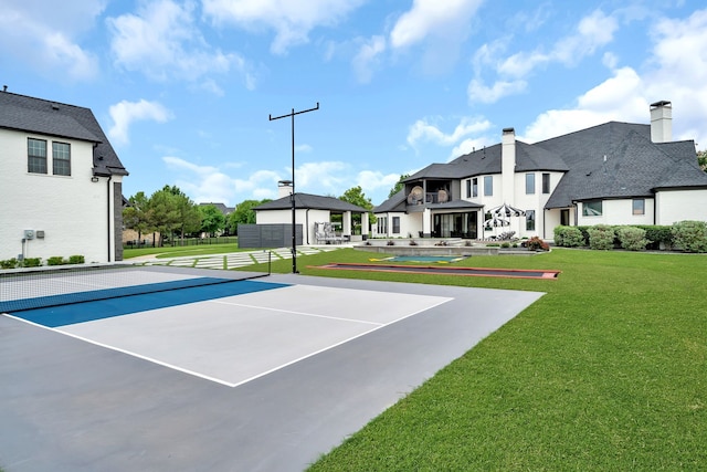 2600 Lakeview Ct, Prosper, TX 75078 - view of tennis court featuring a lawn