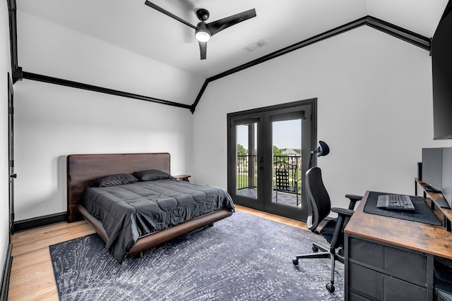 2600 Lakeview Ct, Prosper, TX 75078 - bedroom with vaulted ceiling, access to exterior, french doors, a desk, and wood finished floors