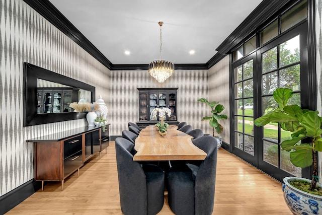 2600 Lakeview Ct, Prosper, TX 75078 - dining area featuring crown molding, a chandelier, wallpapered walls, and light wood finished floors