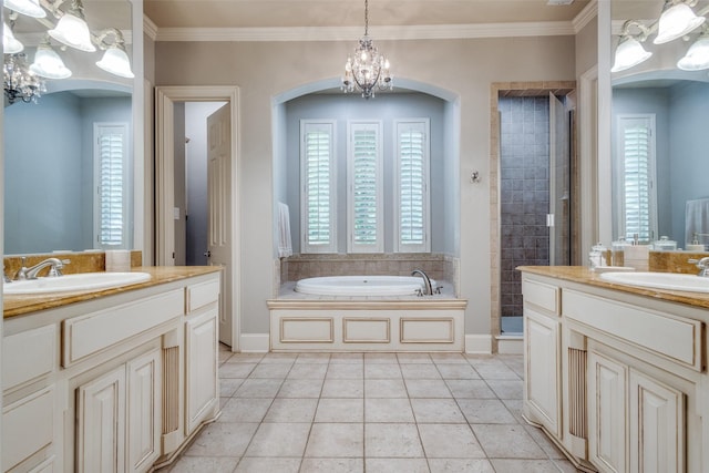 3704 Imperial Dr, Flower Mound, TX 75028 - full bathroom with a chandelier, two vanities, healthy amount of natural light, and crown molding