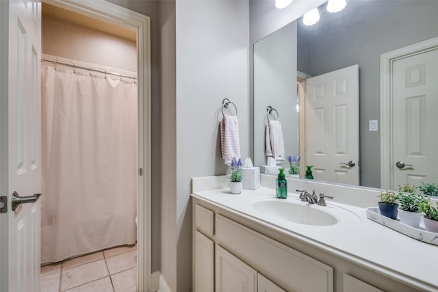 3704 Imperial Dr, Flower Mound, TX 75028 - full bath featuring vanity, tile patterned floors, curtained shower, and baseboards