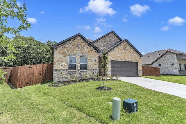 240 Rosemary Dr, Azle, TX 76020 - french country style house featuring driveway, a garage, and stone siding