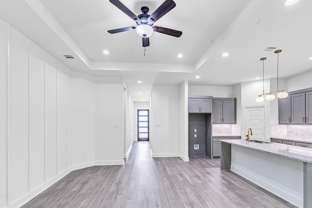 240 Rosemary Dr, Azle, TX 76020 - kitchen featuring gray cabinets, a sink, decorative backsplash, a ceiling fan, and recessed lighting