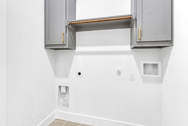 240 Rosemary Dr, Azle, TX 76020 - washroom featuring hookup for an electric dryer, hookup for a gas dryer, baseboards, hookup for a washing machine, and cabinet space