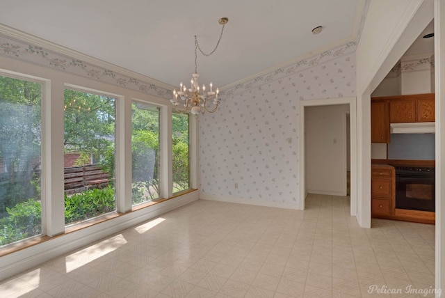 605 Erie St, Shreveport, LA 71106 - spare room featuring healthy amount of natural light, a chandelier, light floors, wallpapered walls, and ornamental molding