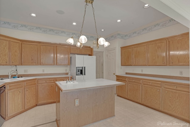 605 Erie St, Shreveport, LA 71106 - kitchen with white fridge with ice dispenser, a sink, a center island with sink, light countertops, and recessed lighting