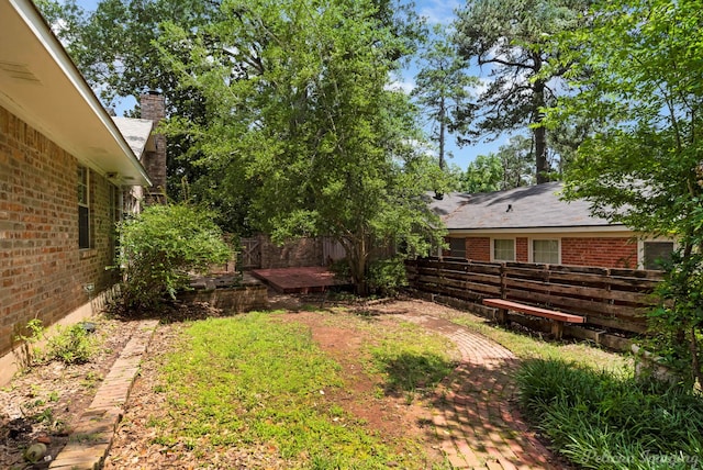 605 Erie St, Shreveport, LA 71106 - fenced backyard with a deck