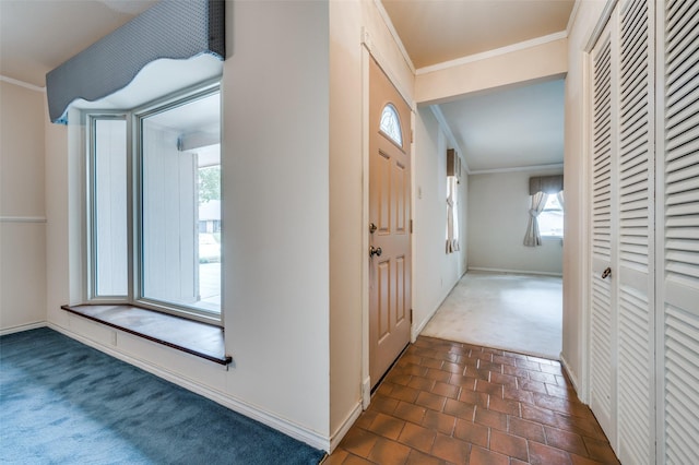 1122 Gloucester Ct N, Irving, TX 75062 - entrance foyer with ornamental molding, brick floors, dark colored carpet, healthy amount of natural light, and baseboards