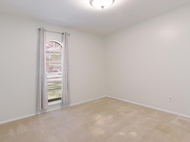 424 Bluebonnet Trl, Garland, TX 75043 - empty room featuring light colored carpet and baseboards