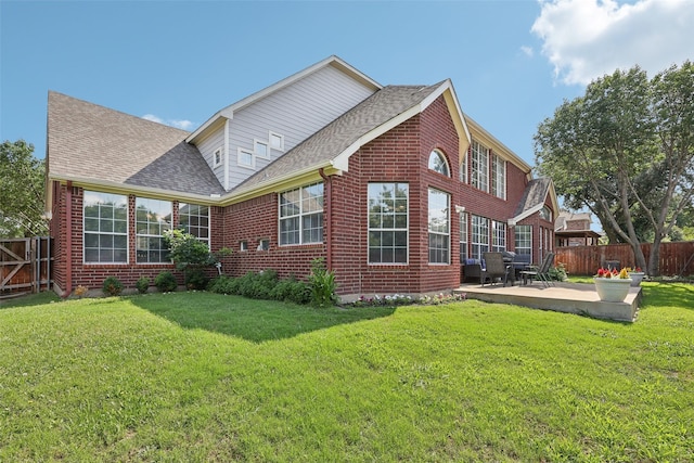 1908 Longfellow Ln, Flower Mound, TX 75028 - rear view of property featuring a patio, roof with shingles, and brick siding