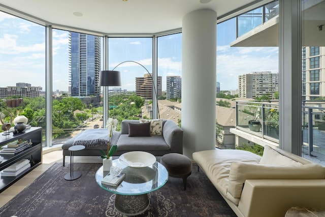 2900 Mckinnon St Unit 604, Dallas, TX 75201 - sunroom featuring a view of city, expansive windows, and tile patterned floors