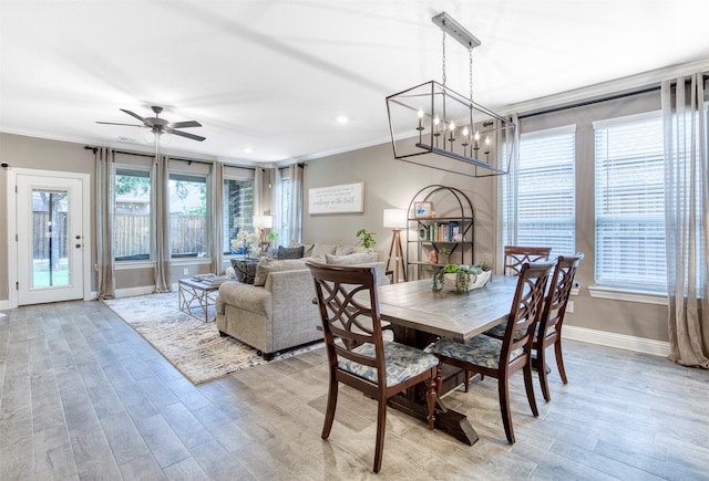 10140 Kingsland Trl, Mckinney, TX 75072 - dining space with ornamental molding, plenty of natural light, baseboards, light wood-type flooring, and recessed lighting