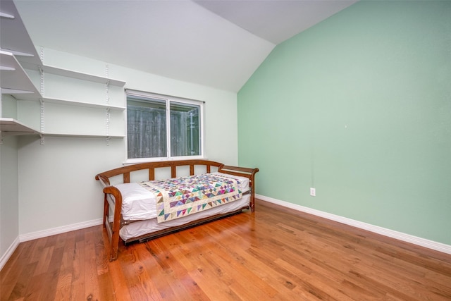 2925 Custer Dr, Corinth, TX 76210 - bedroom with baseboards, vaulted ceiling, and light wood finished floors