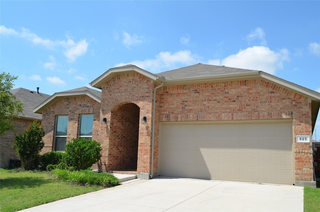 825 Blackhorse Trl, Fort Worth, TX 76247 - view of front of house featuring brick siding, concrete driveway, an attached garage, and a shingled roof