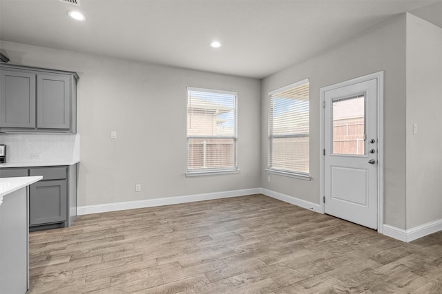 825 Blackhorse Trl, Fort Worth, TX 76247 - unfurnished dining area with light wood-type flooring, baseboards, and recessed lighting