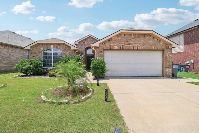 14709 Crystal Lake Dr, Little Elm, TX 75068 - view of front facade featuring brick siding, a front lawn, concrete driveway, and an attached garage