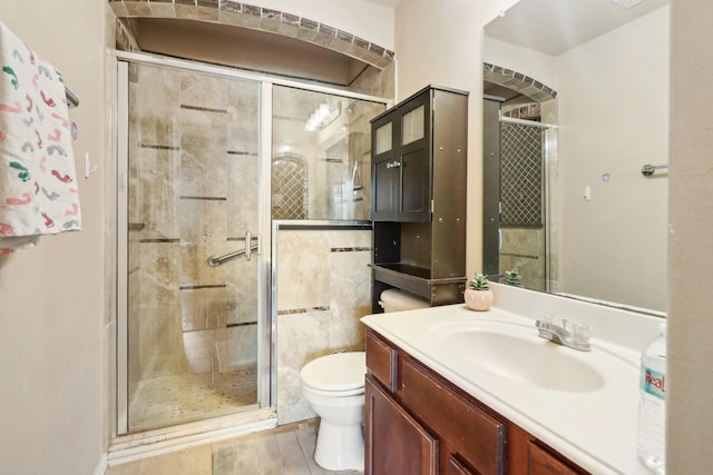 14709 Crystal Lake Dr, Little Elm, TX 75068 - full bathroom featuring toilet, vanity, and a stall shower