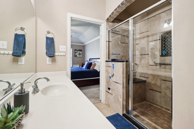 14709 Crystal Lake Dr, Little Elm, TX 75068 - ensuite bathroom with ornamental molding, vanity, a stall shower, and tile patterned floors
